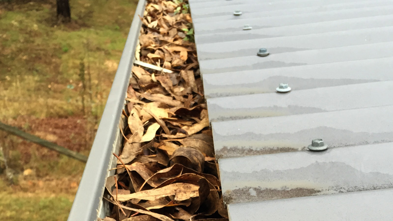 A gutter before cleaning.